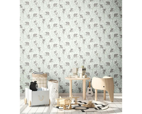 Barnrum med tapet med koalamotiv och leksaker