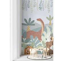 Barnrum med dinosaurietapet, bord, stolar och leksaker