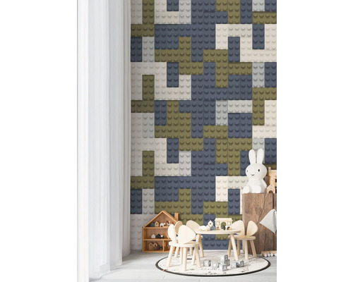 Barnrum med leksaker och väggdekoration i stil med byggklossar