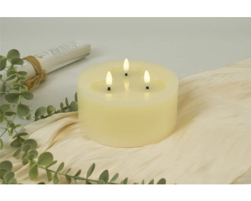 Dekorativt blockljus med tre LED-lågor på tyg