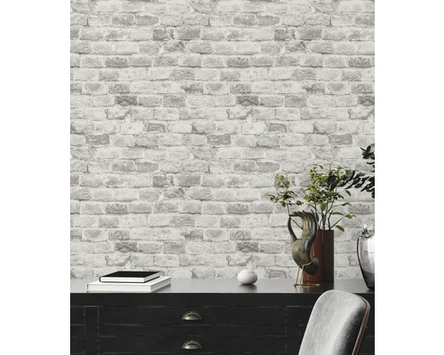 Tapet med stenmönster och möbelarrangemang