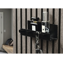 Svart vägghängare med hylla för nycklar och dekoration