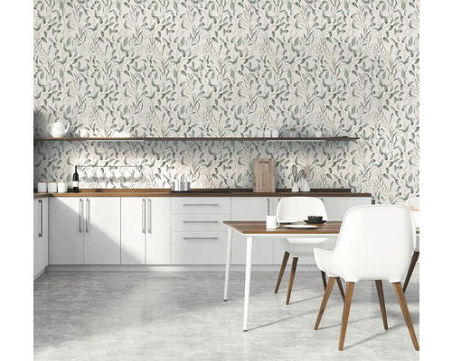 Modernt kök med blommig tapet och vita möbler