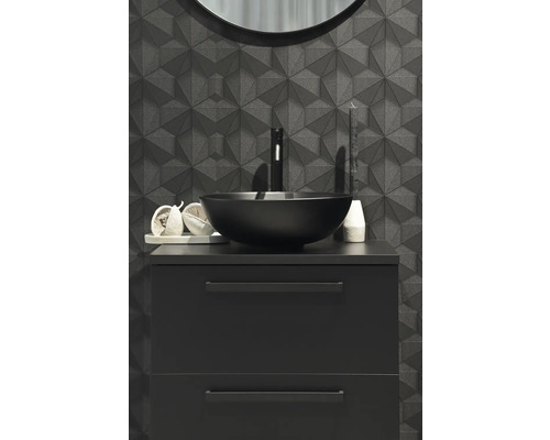 Modernt badrum med tvättställsskåp, handfat och geometrisk väggdesign