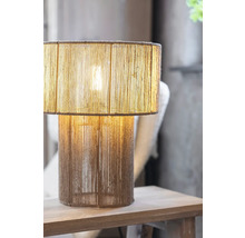 Dekorativ bordslampa av rep på ett bord