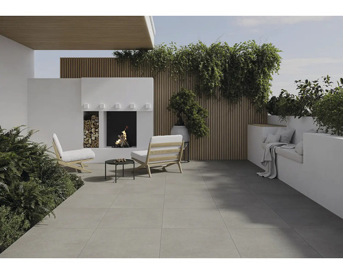 Terrass med sittgrupp, öppen spis och växter