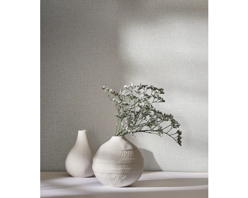 Tapet med två vaser och blomsterarrangemang