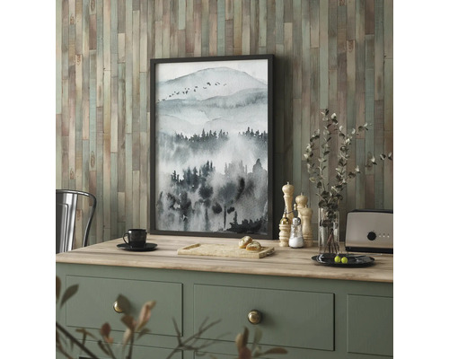 Dekorativ bild med bergslandskap i svartvitt på byrå