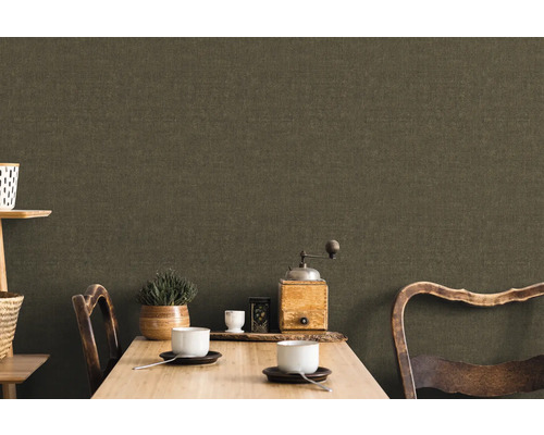 Vardagsrum med textilväv, bord och dekoration