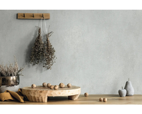 Väggdesign med putsstruktur, örter, nötter och dekoration