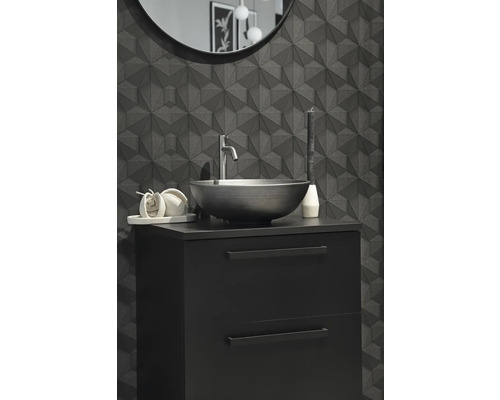 Modernt badrum med tvättställsskåp, handfat och geometrisk väggbeklädnad