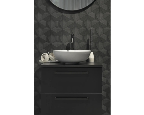 Modernt badrum med svart tvättställsskåp och tvättställsskål