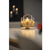 Dekorativt pepparkakshus ljus för julsäsongen