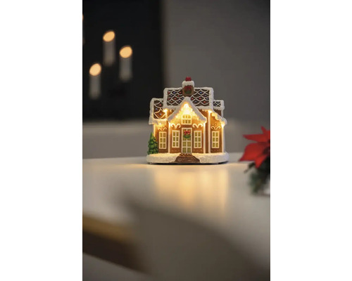 Dekorativt pepparkakshus ljus för julsäsongen