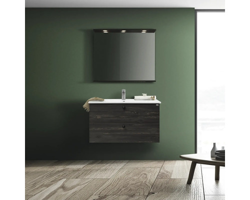 Modernt badrum med tvättställsskåp, spegel och trägolv