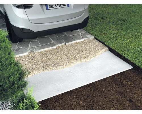 Tvärsnitt av en uppfart med gatstenar, grus och underkonstruktion