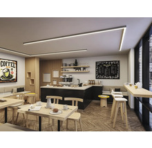 Interiör av ett café med bord, stolar, bardisk och belysning