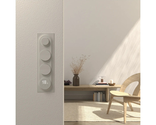 Rumsbild med elektronisk vridreglage för styrning av smarta hemfunktioner