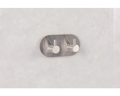 Dubbel klädkrok av metall för väggmontering