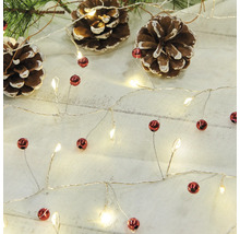 Ljusslinga med röda kulor och tallkottar