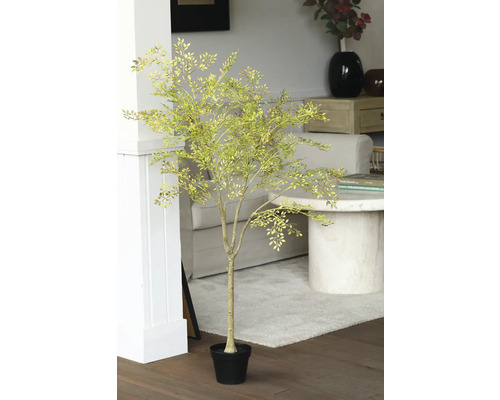 Dekorativt konstgjort träd i kruka för inomhusbruk.