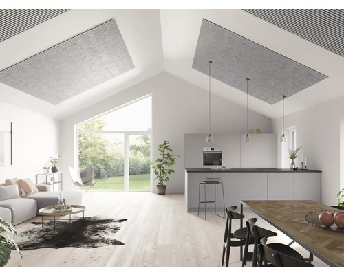 Ljust vardagsrum med akustikpaneler i taket, soffa, matbord och kök