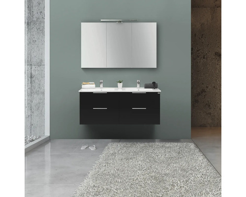 Modernt badrum med svart tvättställsskåp, tvättställsskålar och spegelskåp