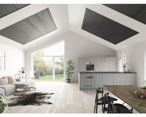 Ljust vardagsrum med takelement, modern inredning och stora fönster