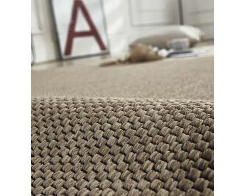 Detaljvy av en vävd matta