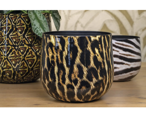 Dekorativa blomkrukor med djurmönster