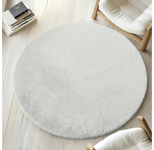 Rund, mjuk matta i en interiör