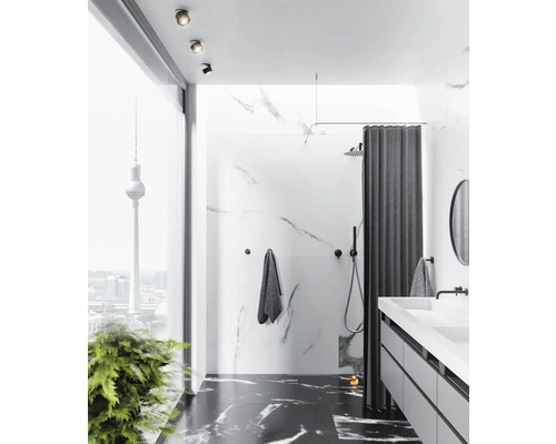 Modernt badrum med marmorväggar, dusch, handfat och utsikt över Berlins TV-torn