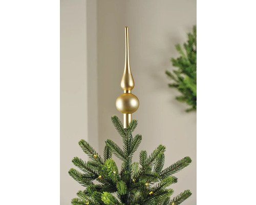 Gyllene julgransspira på en julgran