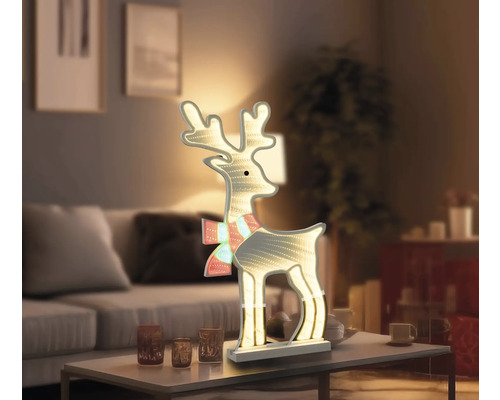 Dekorativ lysande ren för julperioden i vardagsrummet.