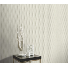 Dekorativ väggdesign med en 3D-väggpanel i vågdesign.