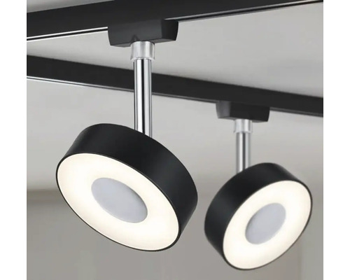 Två runda, svarta LED-spotlights på en skena