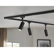 Svart skensystem med tre spotlights i taket