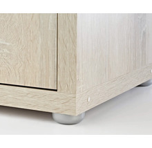 Detaljvy av möbel med trästruktur och ben