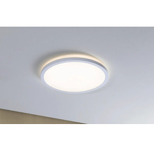 Rund taklampa med vit ram i taket