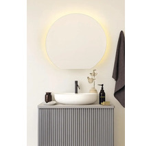 Badrum med rund spegel, handfat och underskåp