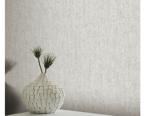 Strukturmönstrad tapet med vas och dekoration på ett bord