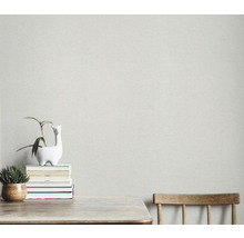 Ljust strukturtapet på en vägg