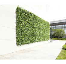 Väggpanel med konstgjorda gröna växter för dekoration