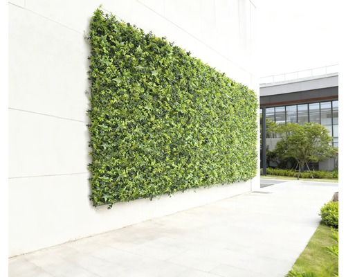 Väggpanel med konstgjorda gröna växter för dekoration