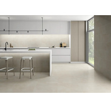 Modernt kök med klinkergolv, köksö och minimalistisk design