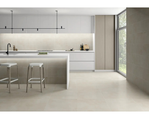 Modernt kök med klinkergolv, köksö och minimalistisk design