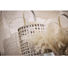 Dekorativ lykta med flätad design och handtag