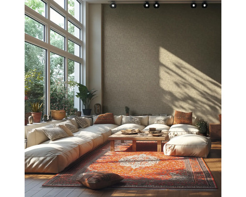 Ljust vardagsrum med stora fönster, hörnsoffa, matta och träbord