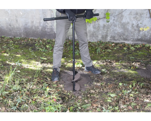 Borrmaskin för markarbeten i bruk.