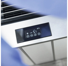 Detaljvy av en elektronisk display som visar temperatur, luftfuktighet och olika lägen på en enhet